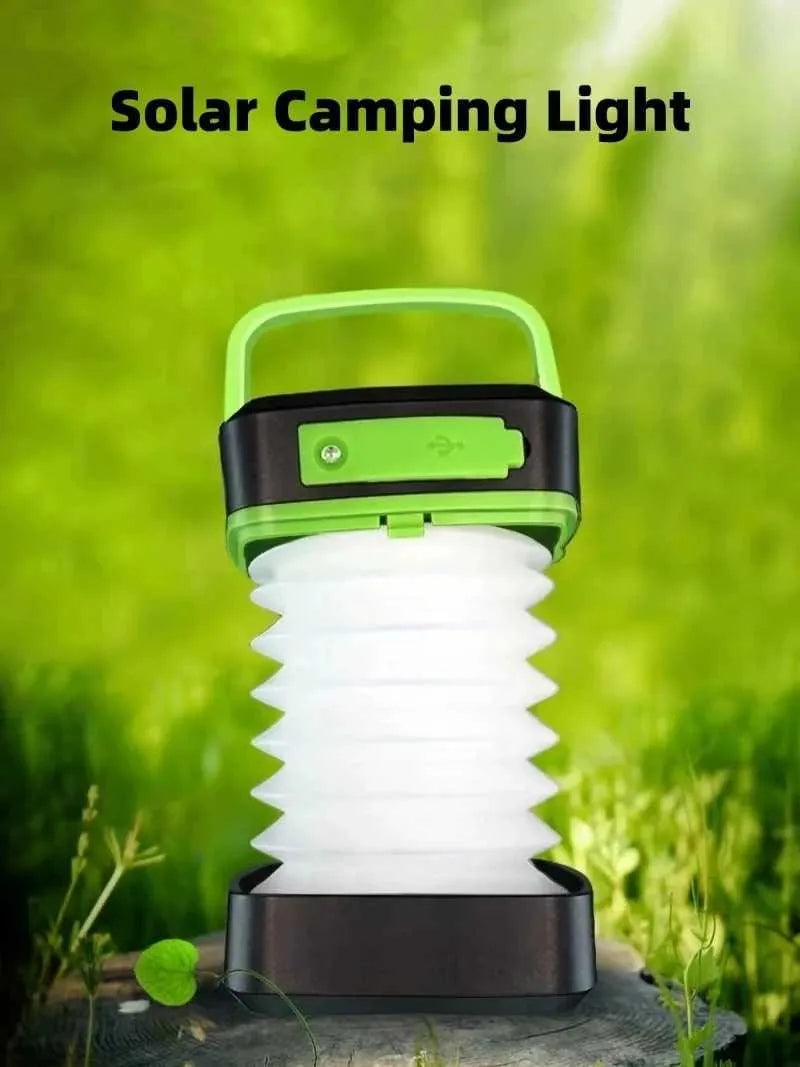 Green and black solar camping light with handle and ribbed glowing diffuser