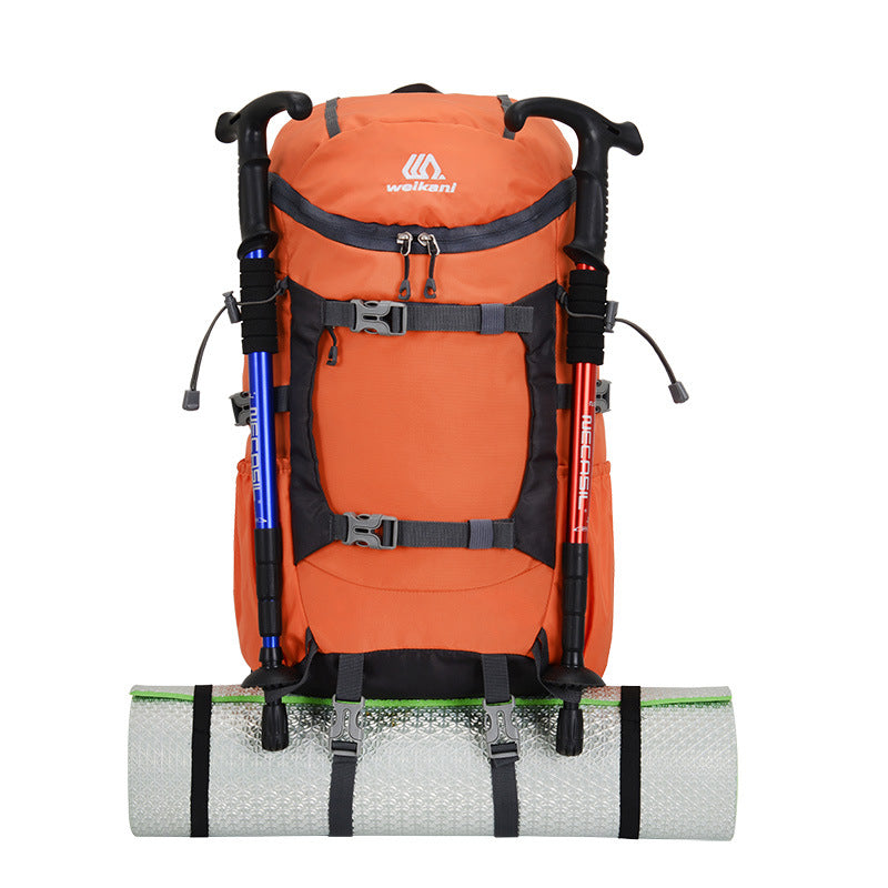 Orange hiking backpack with padded shoulder straps and front zipper compartment