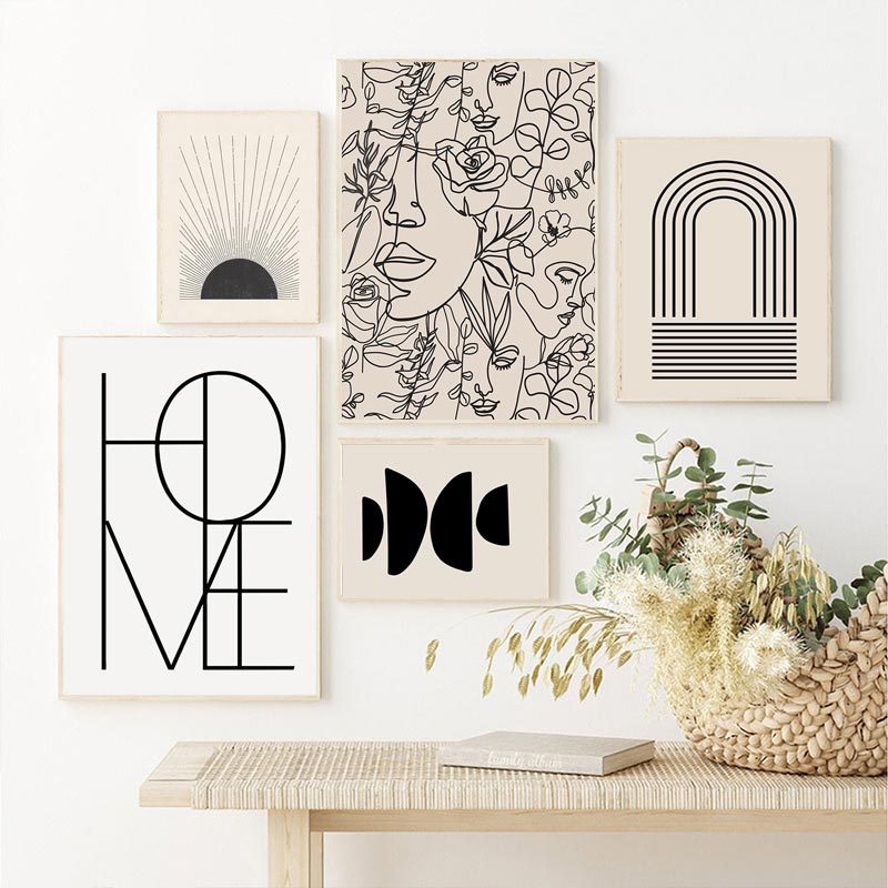 Set of framed abstract art posters with black botanical line drawings and shapes