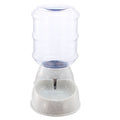 Gravity pet water dispenser with clear reservoir and light gray single-bowl base