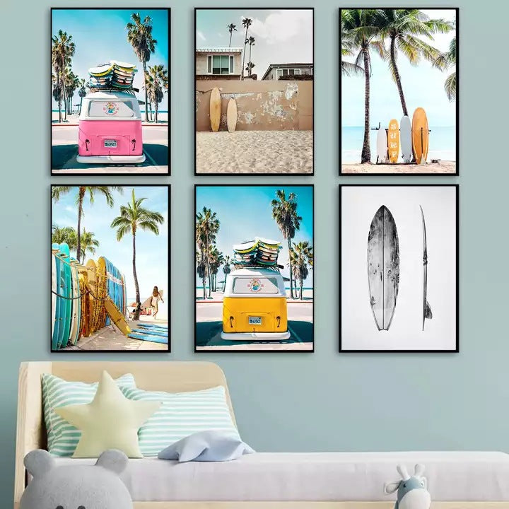 Beach-themed canvas print set in black frames on a wall above a couch