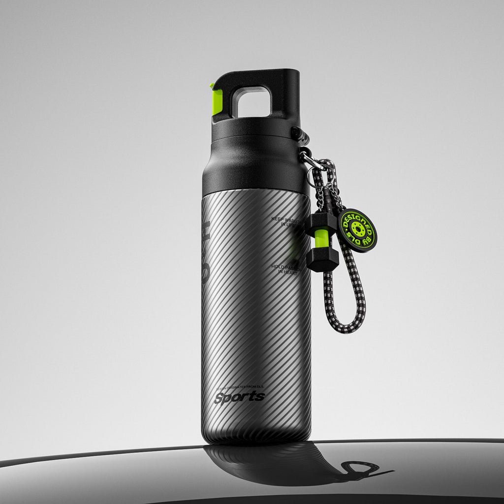 Black sports water bottle with quick-open handle and dangling keychain, 580 ml