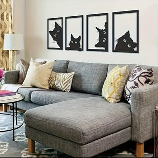 Black cat metal wall art set with four black-framed cat silhouettes on wall