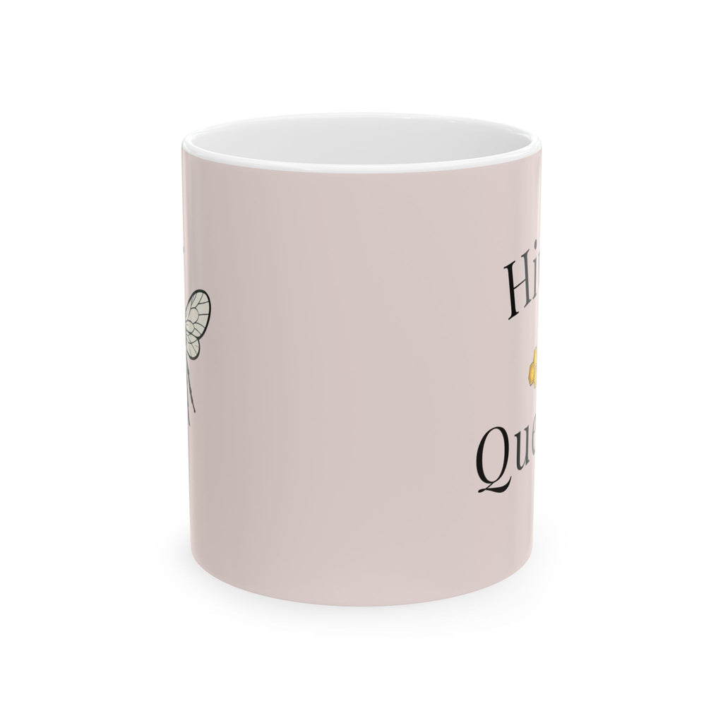 Pink ceramic mug with partial 'Hive' lettering and small bee illustration