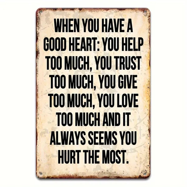 Distressed vintage metal sign with quote text and rust-brown border on beige