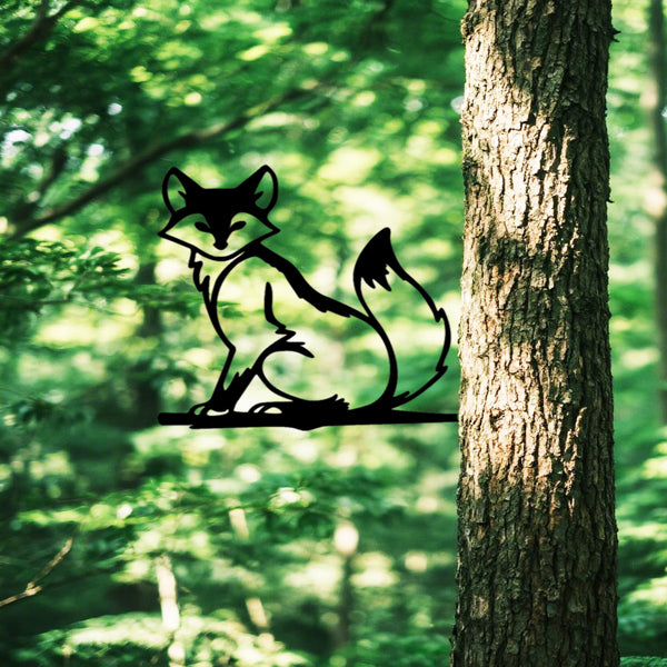 Black metal fox silhouette wall sign, seated fox outline with raised ears and tail