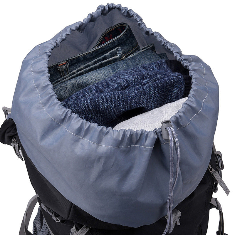 Hiking backpack top opening with cinch drawcord and visible inner zip storage