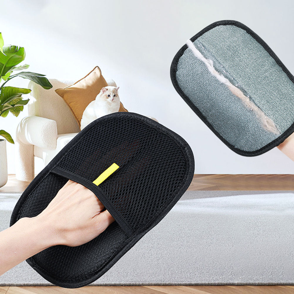 Pet hair remover grooming glove and matching gray pad with hand-held brush surface