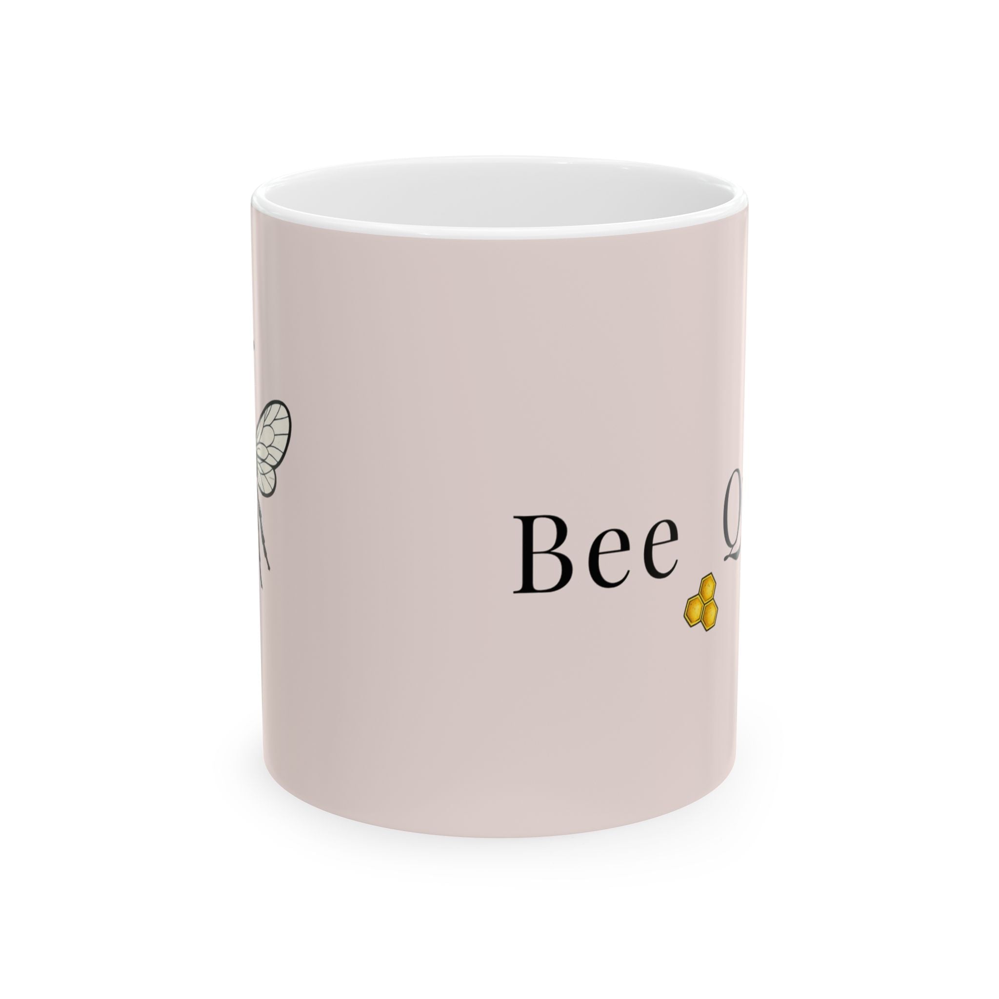Pink ceramic mug with 'Bee' lettering and small bee illustration