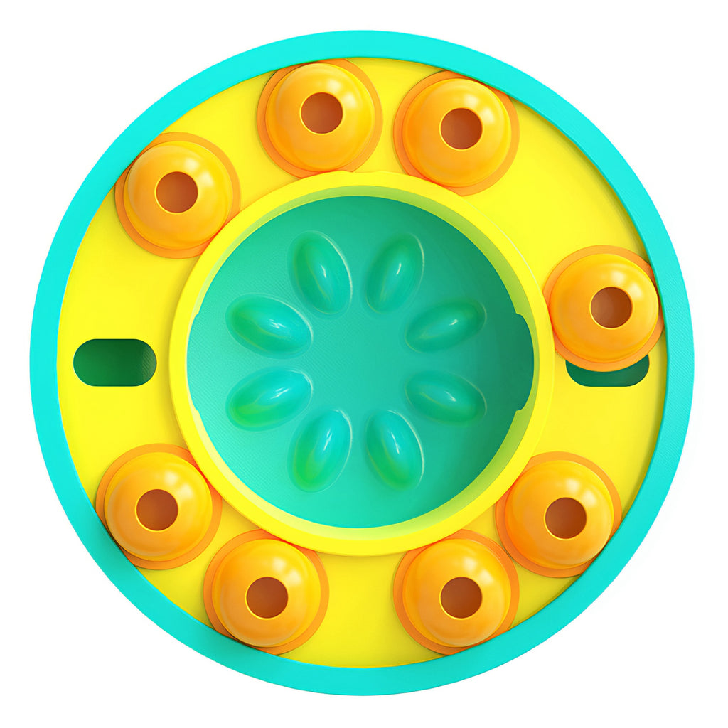 Yellow and green slow-feeder dog bowl top view with eight rotating treat wells