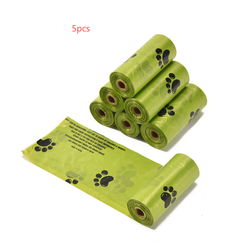 Green pickup bag rolls (5 pcs) with black paw print icons