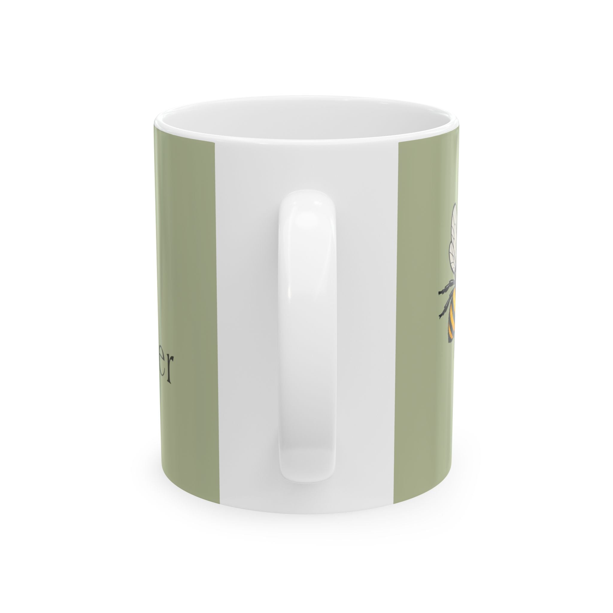 Sage green ceramic mug with vertical white panel and partial printed text