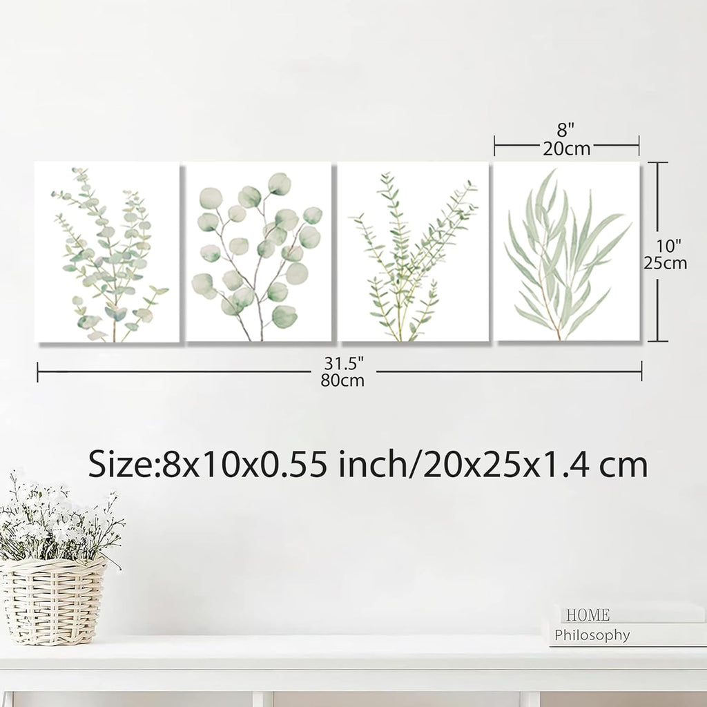 Four framed botanical leaf canvas prints with size measurements shown above