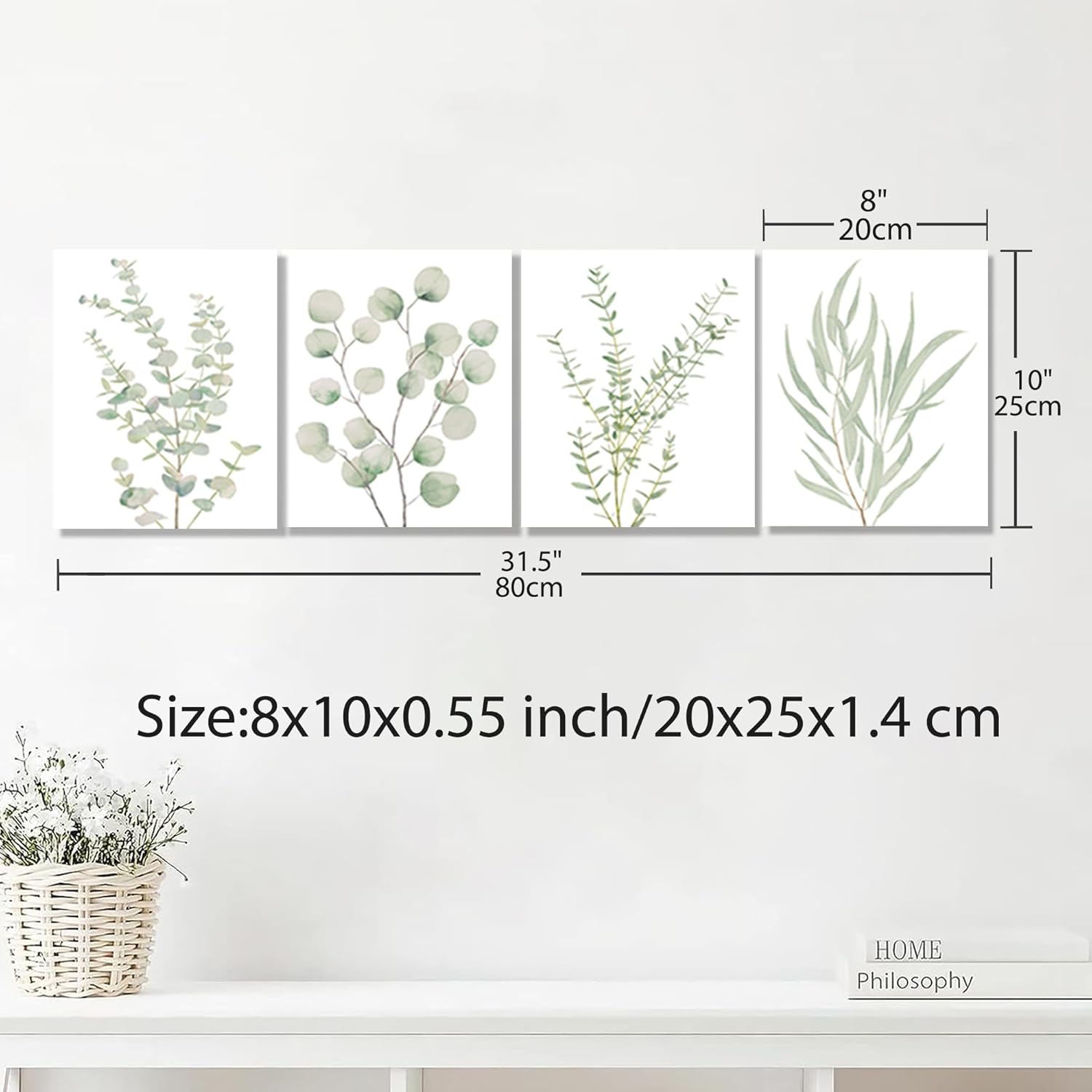 Four framed botanical leaf canvas prints with size measurements shown above