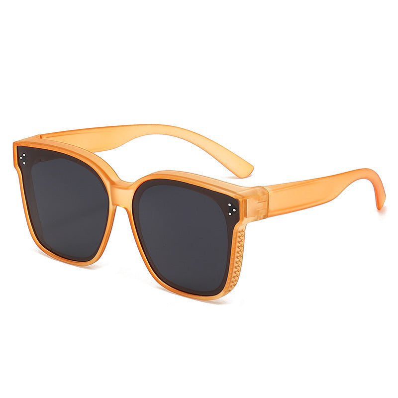 Orange polarized mirror sunglasses with dark lenses and slightly rounded square shape