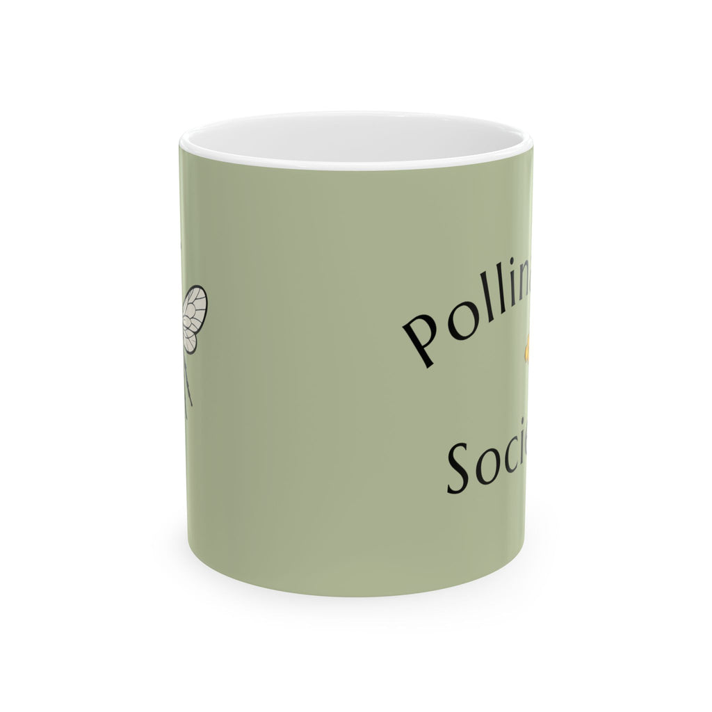Green ceramic bee mug with black Pollinator Society text, partial side design