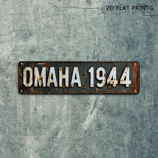 Vintage military metal sign with rivets, reading OMAHA 1944