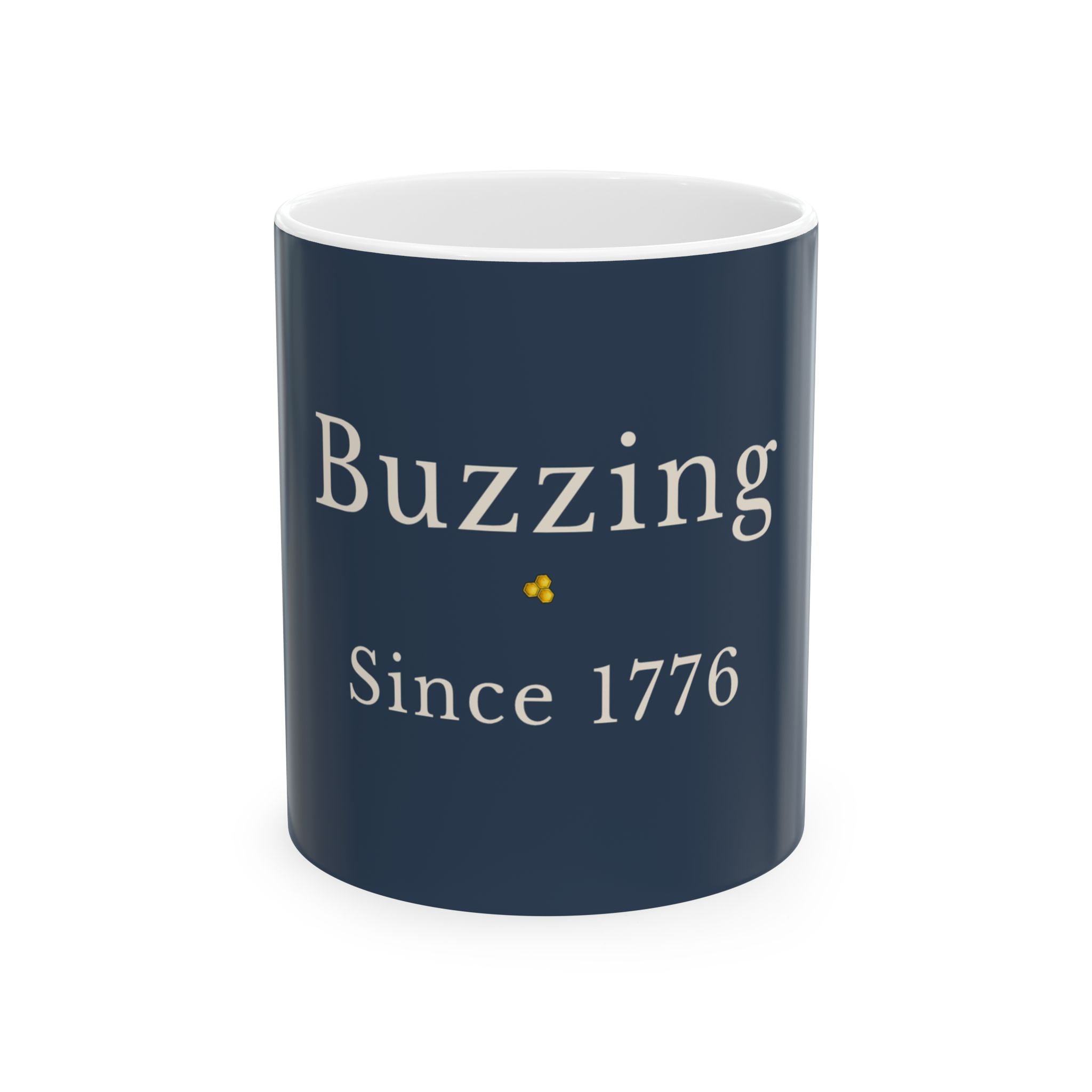Navy ceramic mug with 'Buzzing' and 'Since 1776' text on front