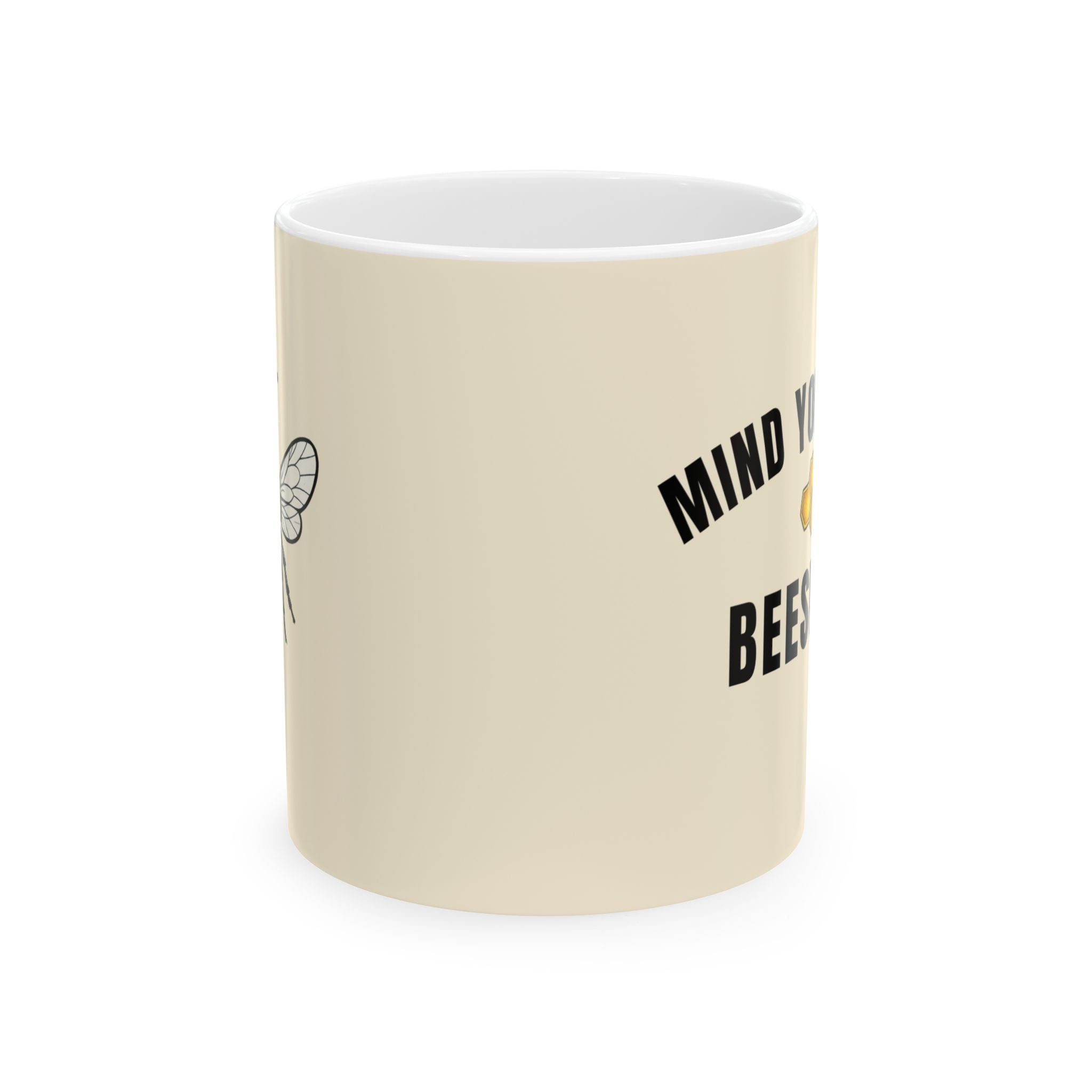 Beeswax ceramic mug, light cream with black “MIND YOUR OWN BEESWAX” text