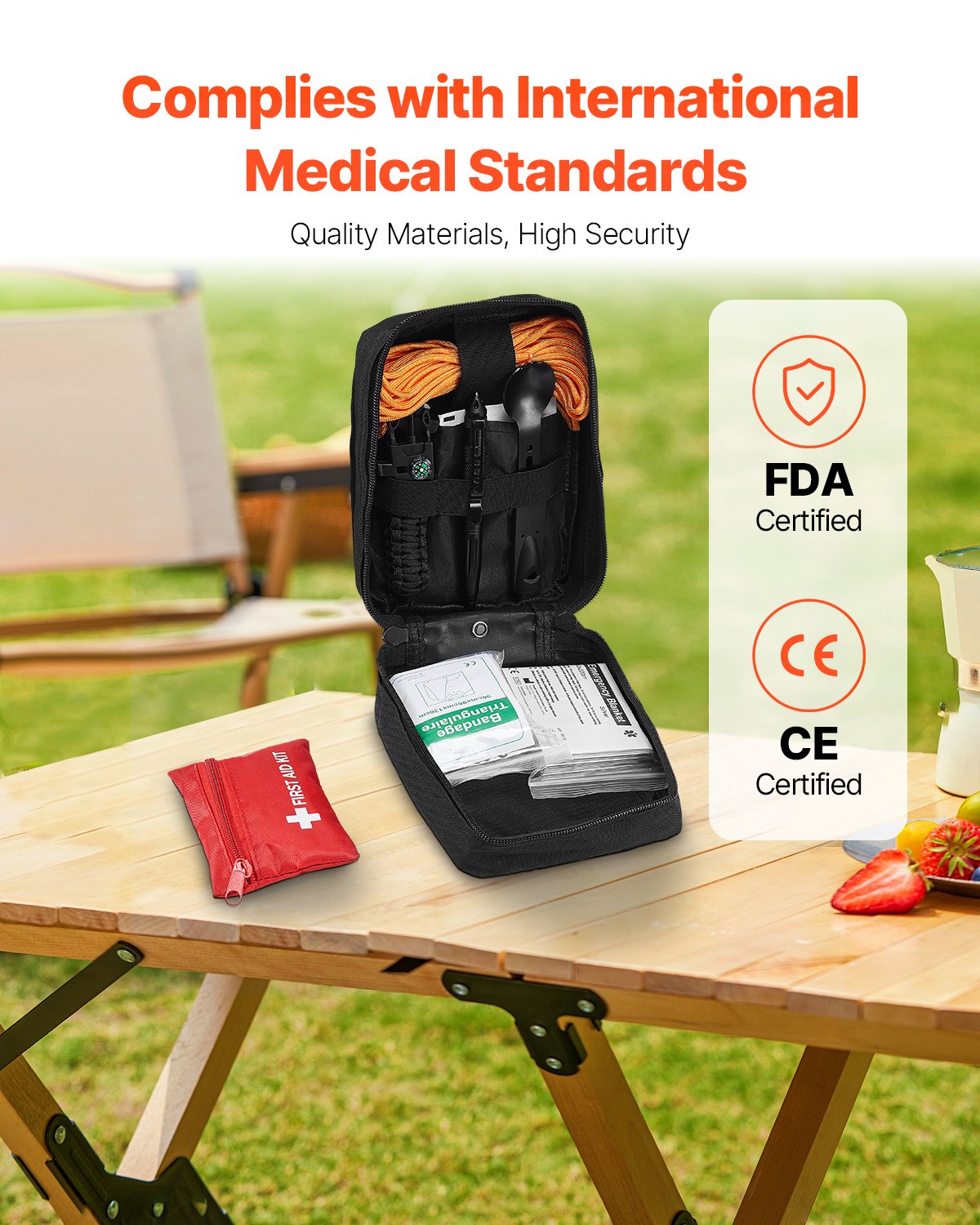 Black first aid kit bag with red cross patch, open with medical items