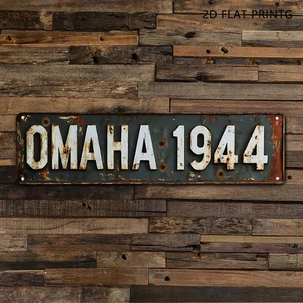 Vintage military metal sign with rivets, reading OMAHA 1944
