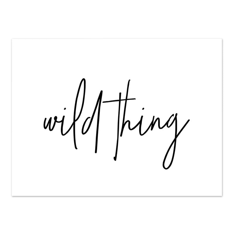 Frameless wall poster with black cursive phrase "wild thing" on white background