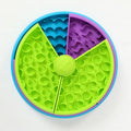 Green rotating slow feeder puzzle bowl with purple and blue divided tiers
