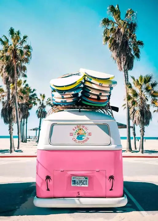 Pink camper van canvas print with stacked surfboard decks and tall palm trees