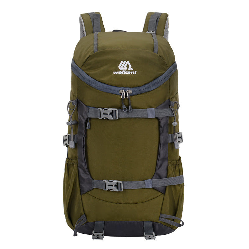 Olive green hiking backpack with front pocket and adjustable harness straps