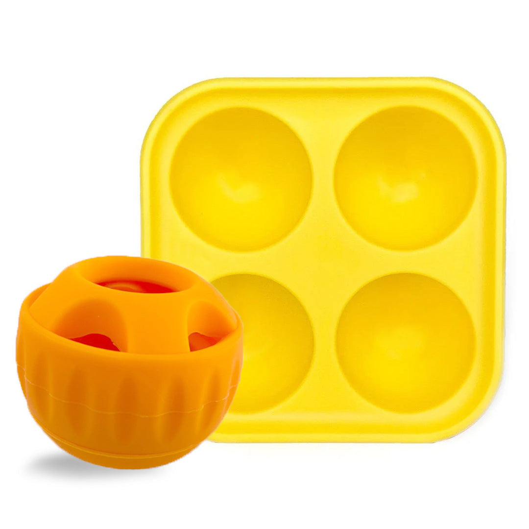 Yellow silicone slow feeder tray with four wells and orange slow feeder ball