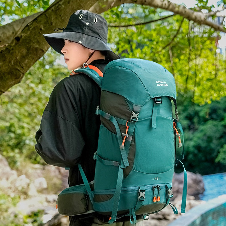 Hiking backpack 35L in teal/green with front straps and padded back panel