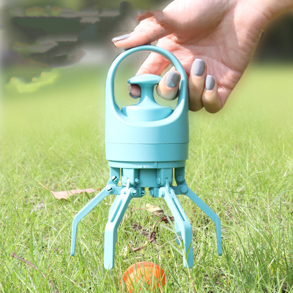 Light blue dog poop scooper kit being held above grass, with scoop arms visible