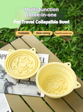 Collapsible pet travel bowl set with two yellow slow-feeder dishes and suction-cup bases