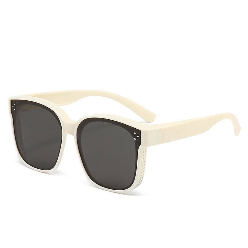 Cream polarized mirror sunglasses with dark lenses and square angular frames