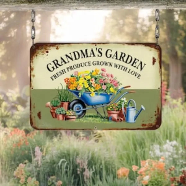 Vintage metal garden sign with GRANDMA'S GARDEN text, green and cream background, garden art