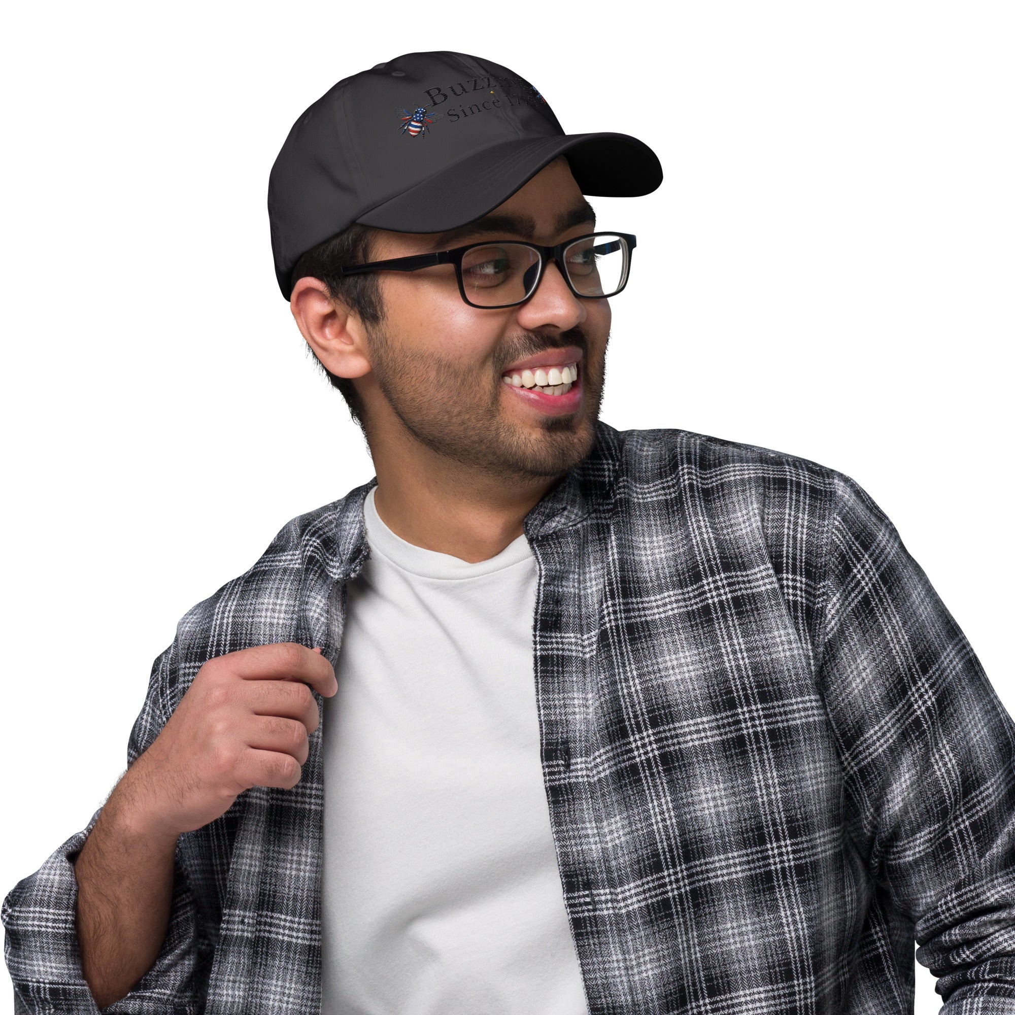 Dark grey dad hat with embroidered bee and “Buzzing Since 1776” text