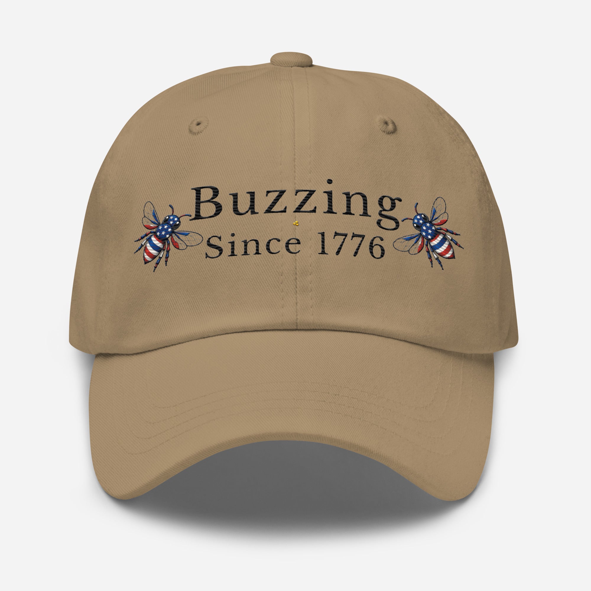 Khaki dad hat with “Buzzing Since 1776” text and bee graphic embroidery on front