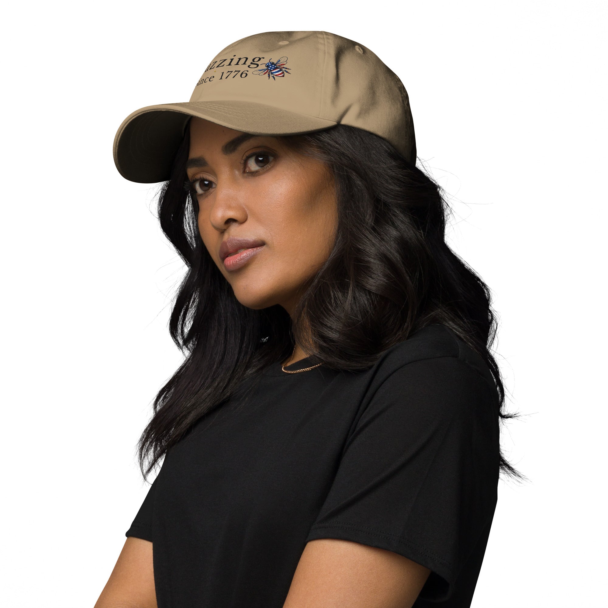 Stone tan dad hat with embroidered text and small bee patch on the front.