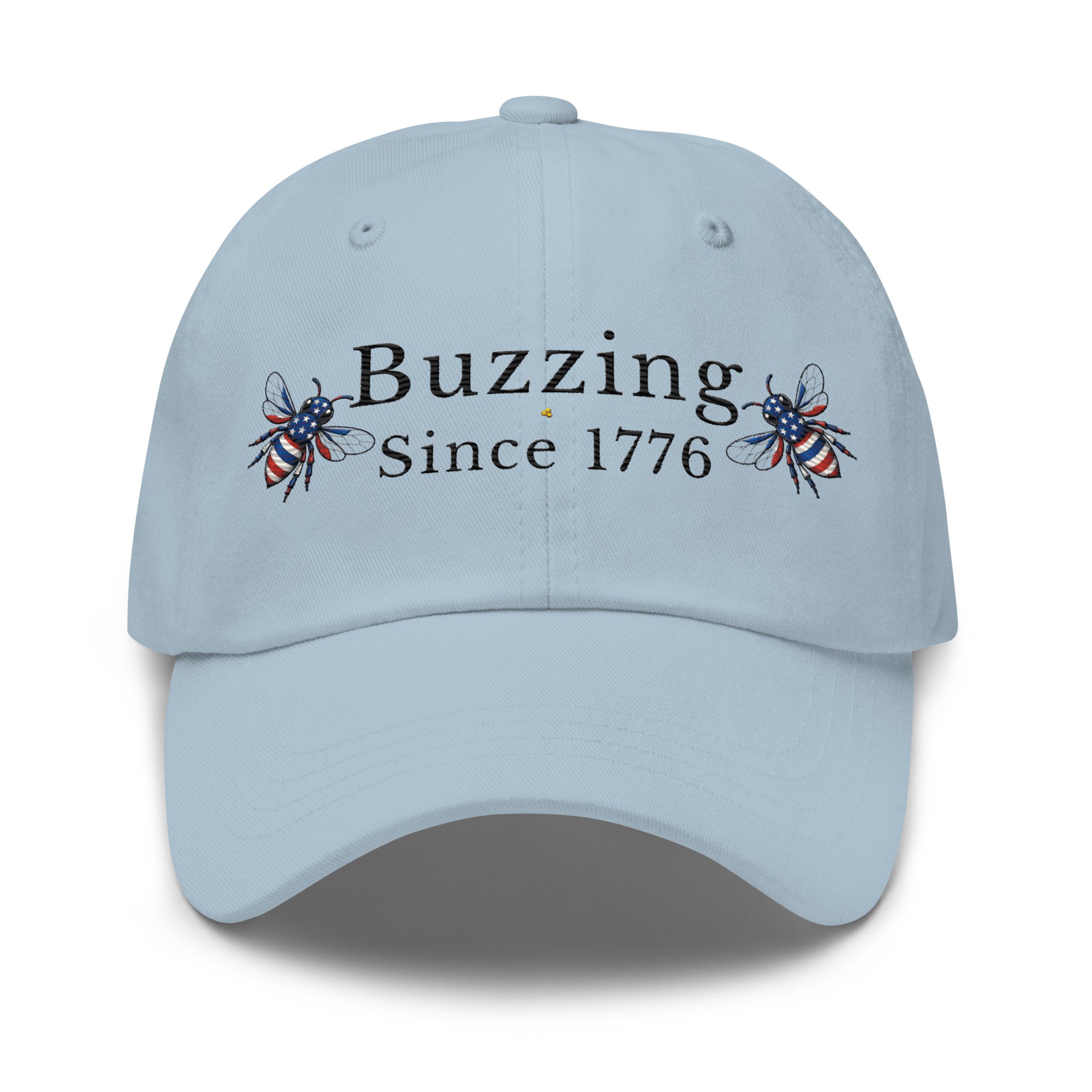 Light blue dad hat with 'Buzzing Since 1776' lettering and bee graphic