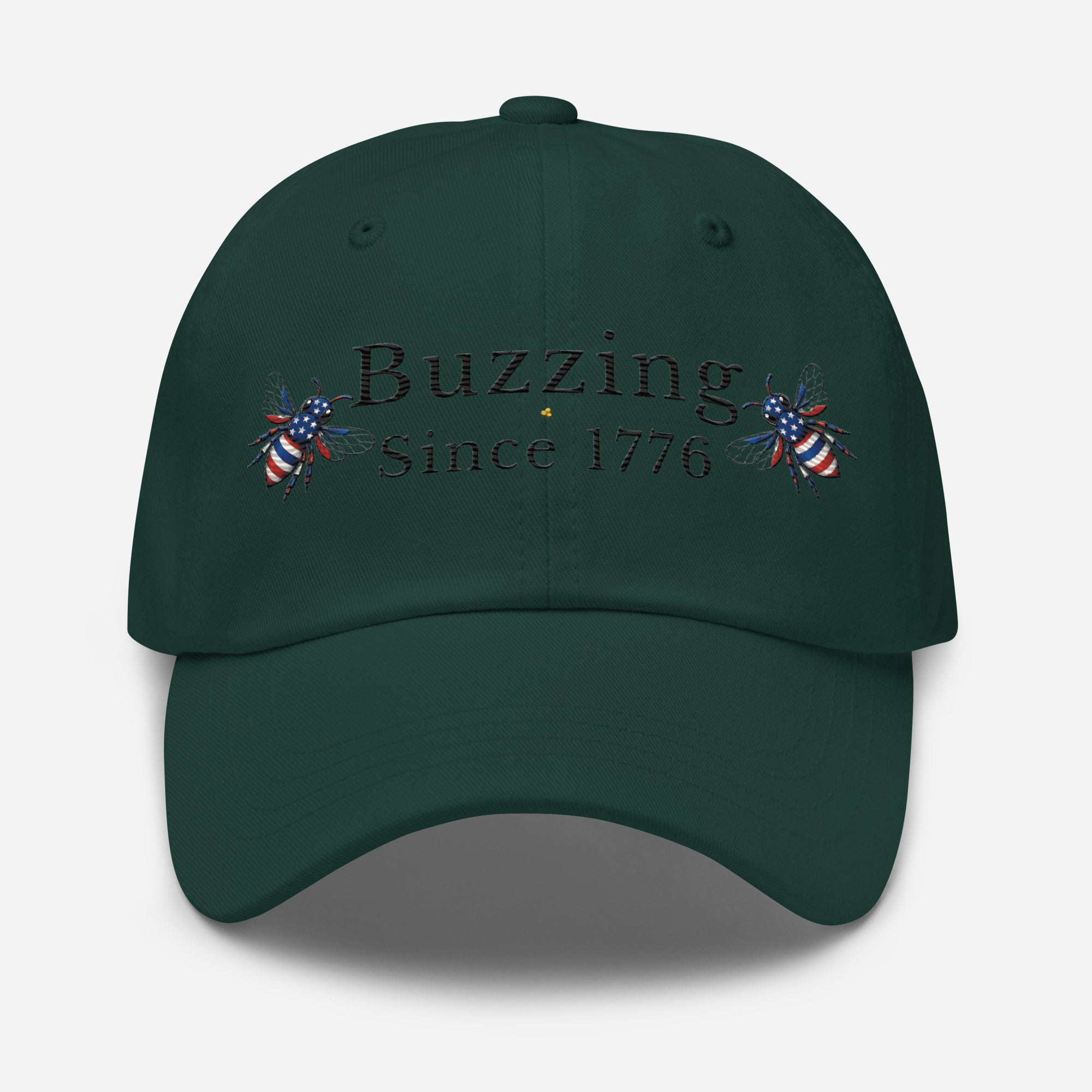 Dark green dad hat with “Buzzing Since 1776” text and bee graphic embroidery on front