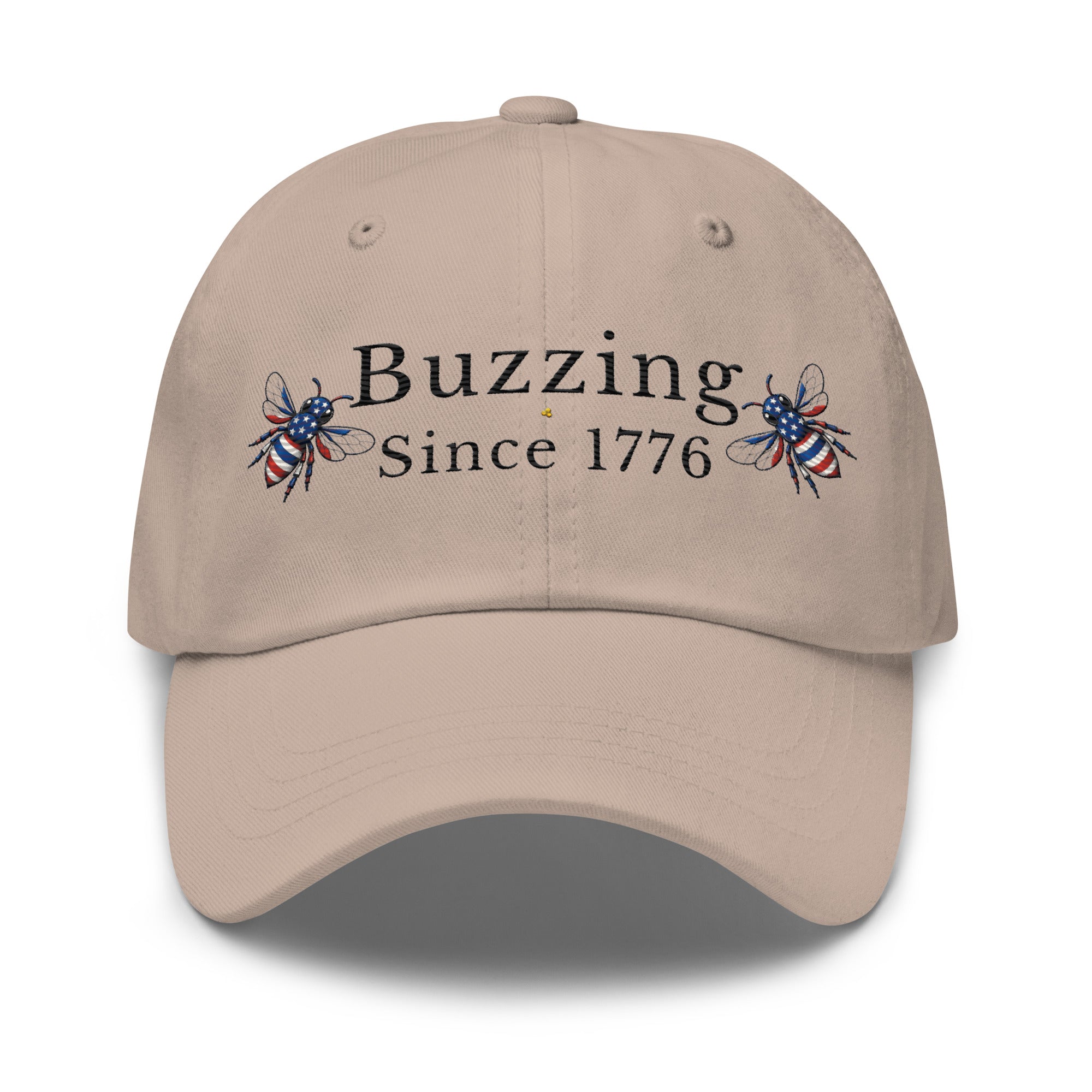 Stone dad hat with 'Buzzing Since 1776' lettering and bee graphic