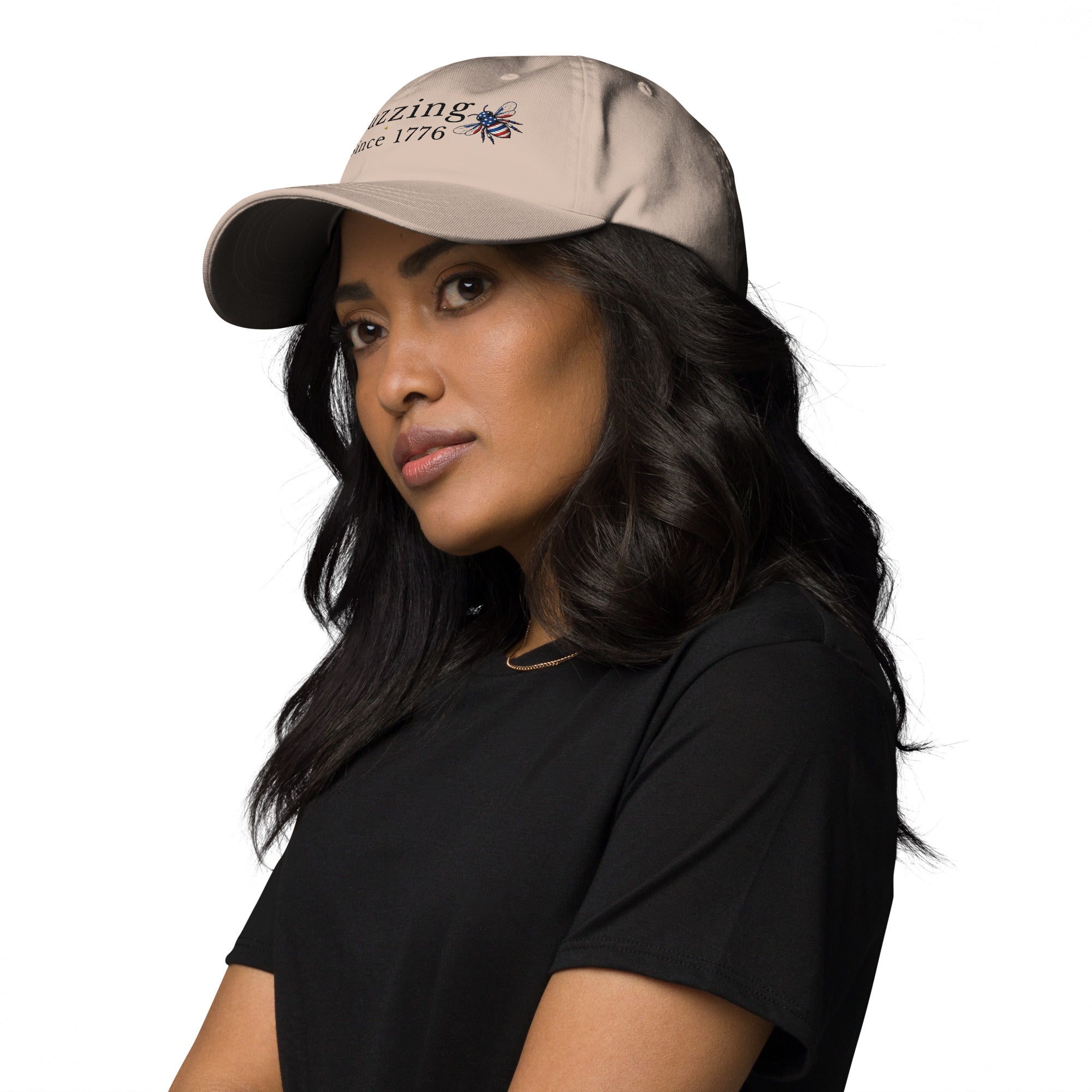 Stone dad hat with embroidered bee and “Buzzing Since 1776” text