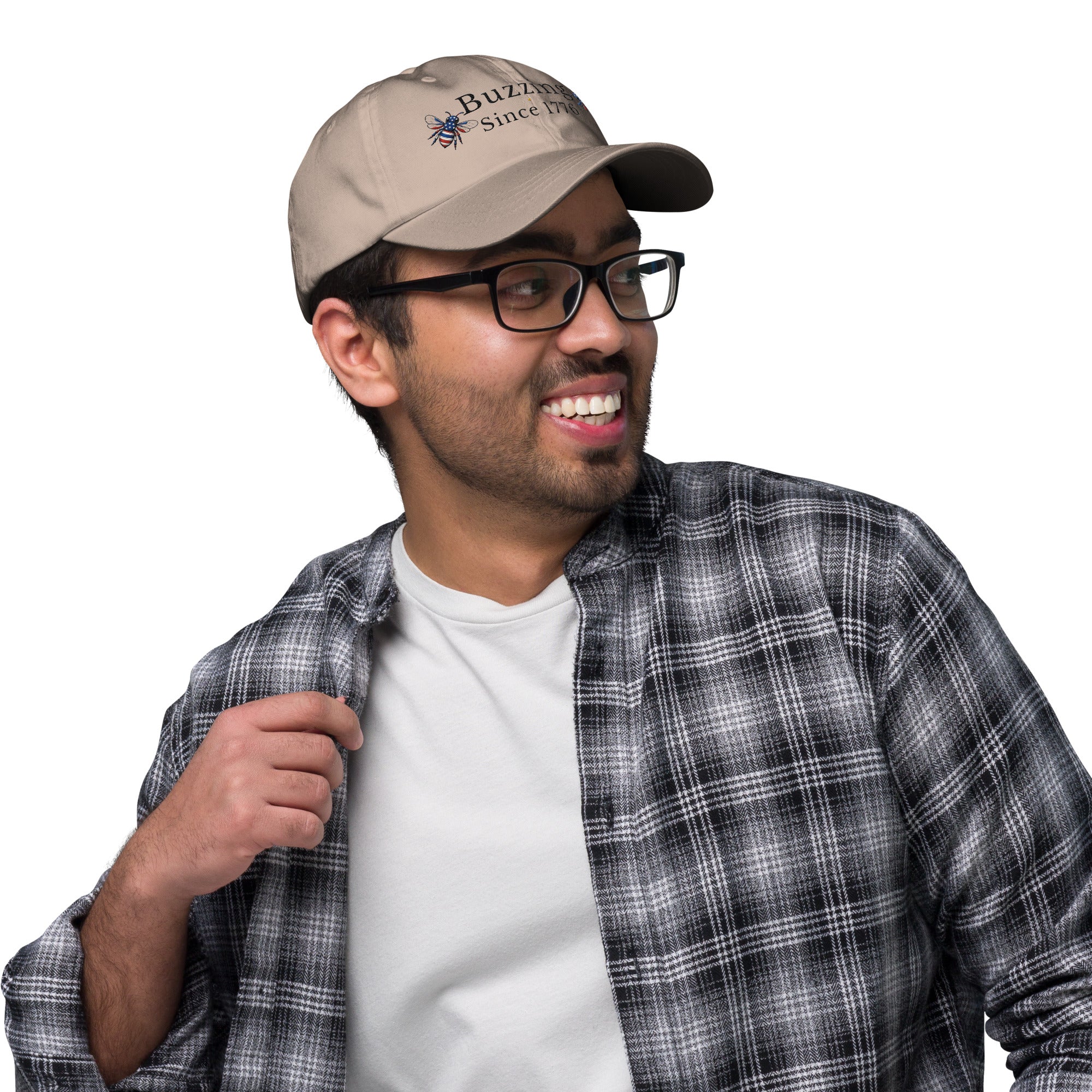 Khaki dad hat with embroidered bee patch and “Buzzing Since 1776” text
