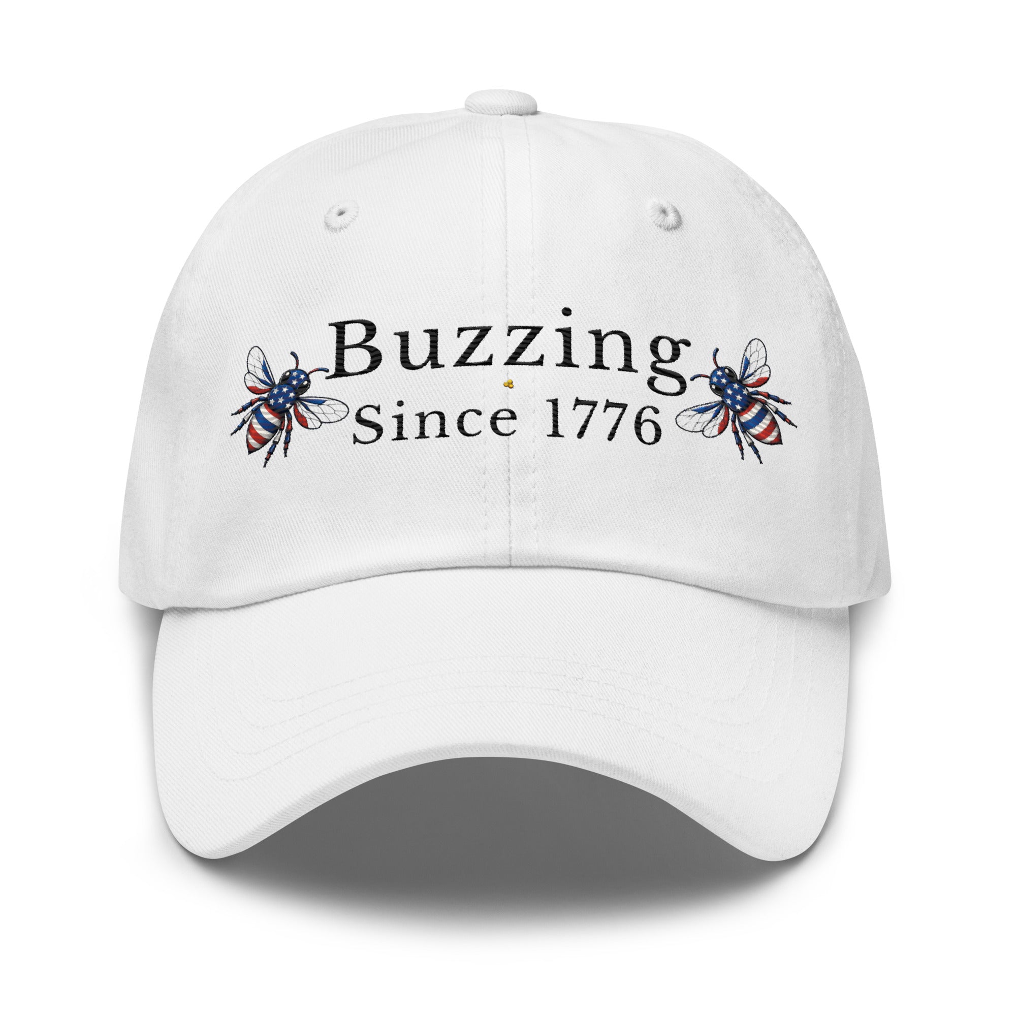 White dad hat with 'Buzzing Since 1776' lettering and bee graphic