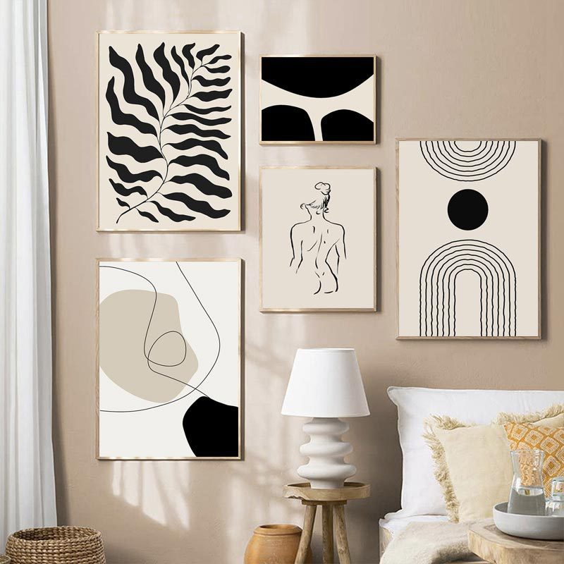 Set of framed abstract art posters with zebra-like leaf waves and minimalist figures