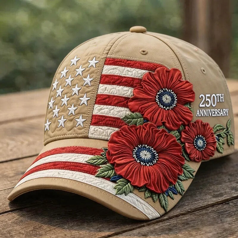 Tan baseball cap with stars-and-stripes patch and red 3D floral embroidery, “250th Anniversary”