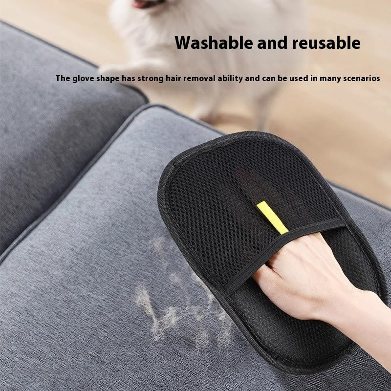Pet deshedding grooming glove in use on upholstery with black mesh and yellow tag