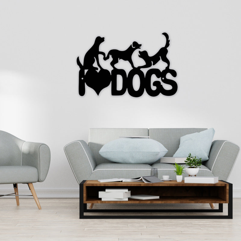 Abstract iron wall hanging with black dog silhouettes and “DOGS” lettering