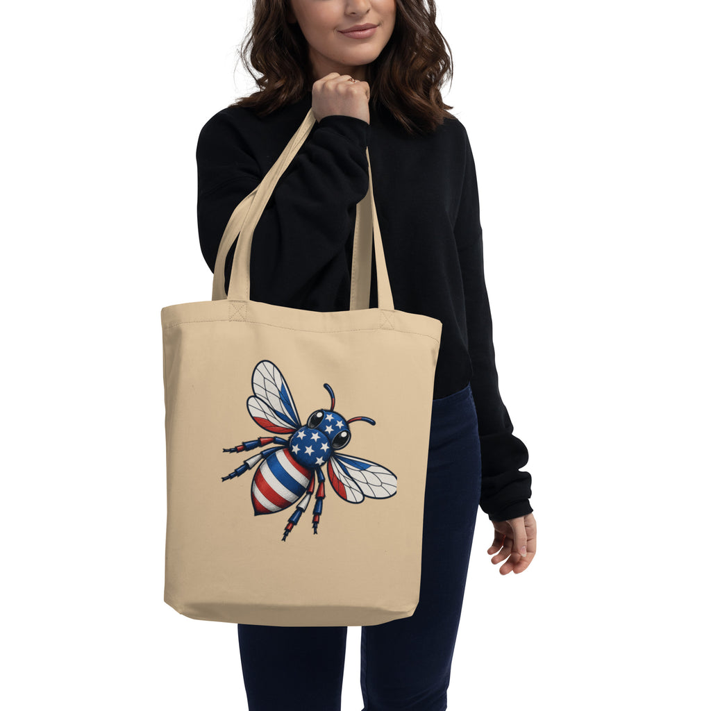 Black eco tote bag with colorful bee graphic, wide handles and stitched top edge