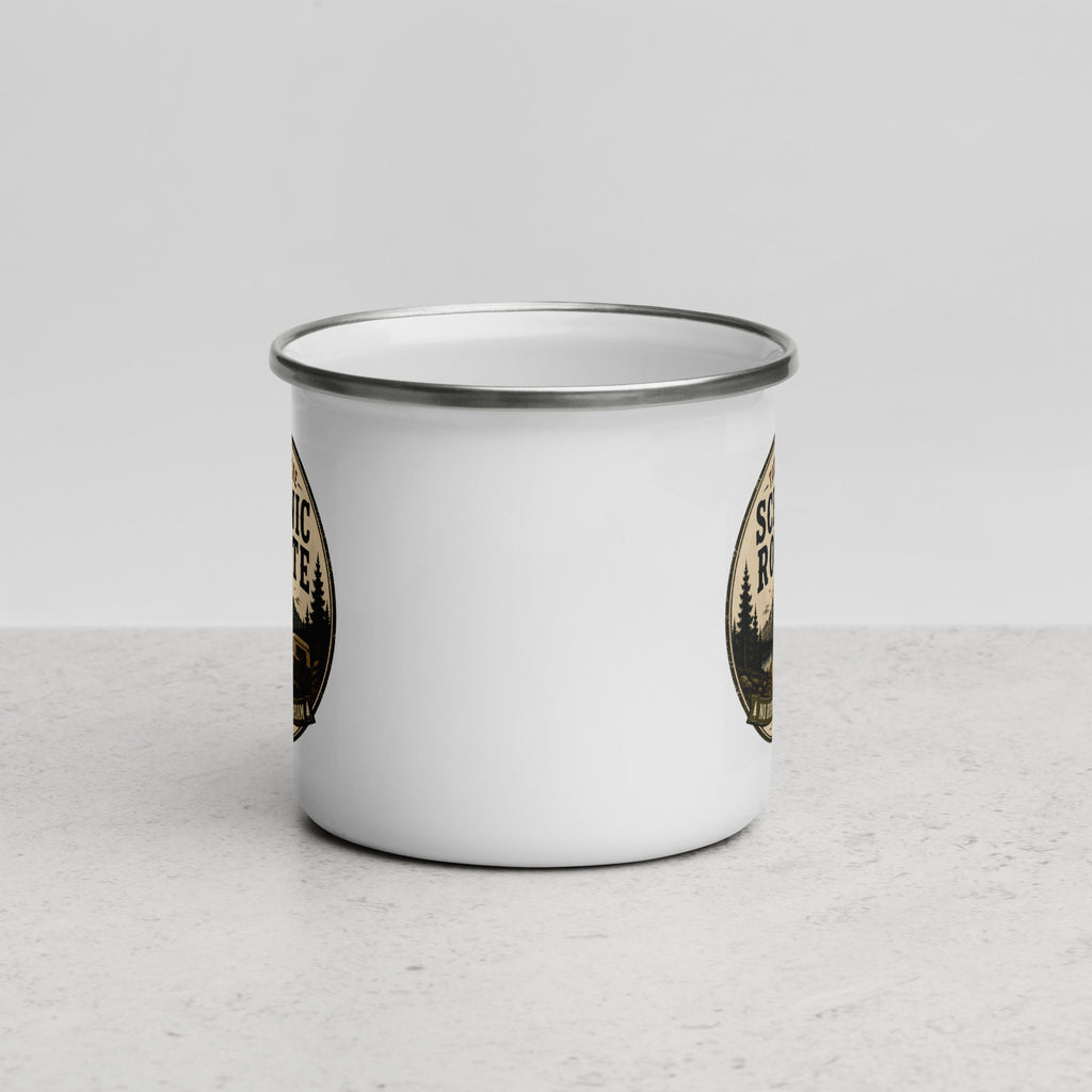 White enamel mug with silver rim, partial Scenic Route graphics on both sides.